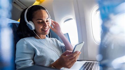 how to listen to music on a plane: the secret to choosing the right headphones